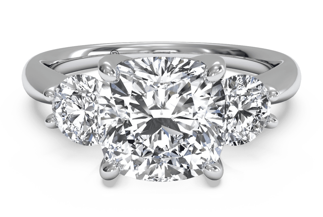 The Olivia Three-Stone / 0.60 Carat Cushion Diamond
