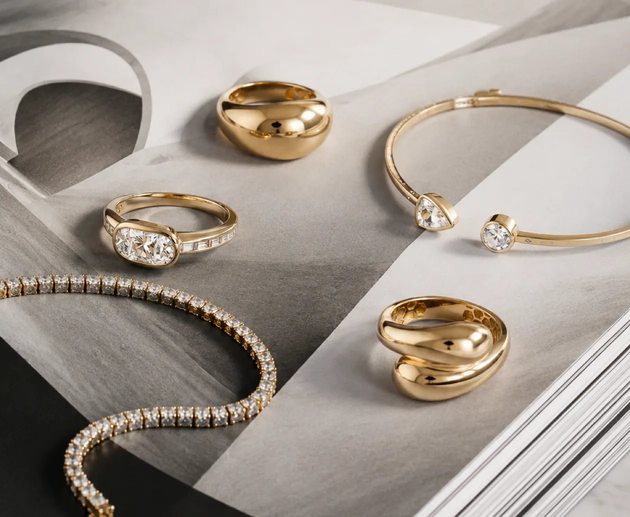 gold jewelry displayed on table