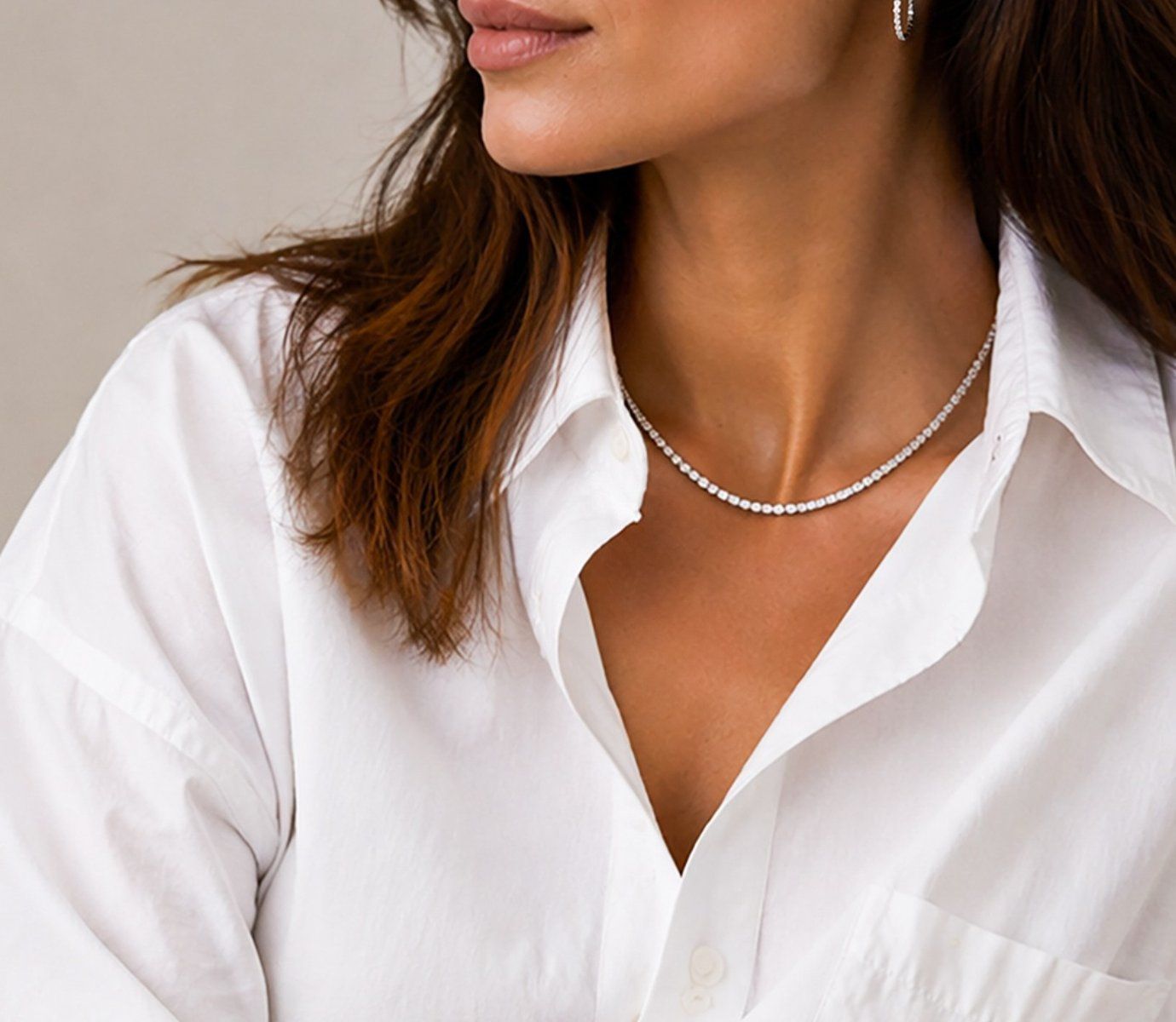 woman wearing diamond jewelry