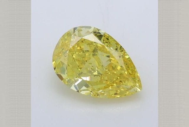 1.03 Carat Pear Yellow Lab Diamond