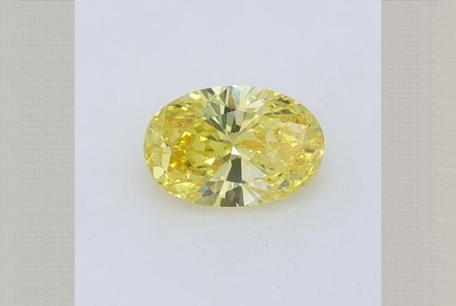 0.40 Carat Oval Yellow Lab Diamond