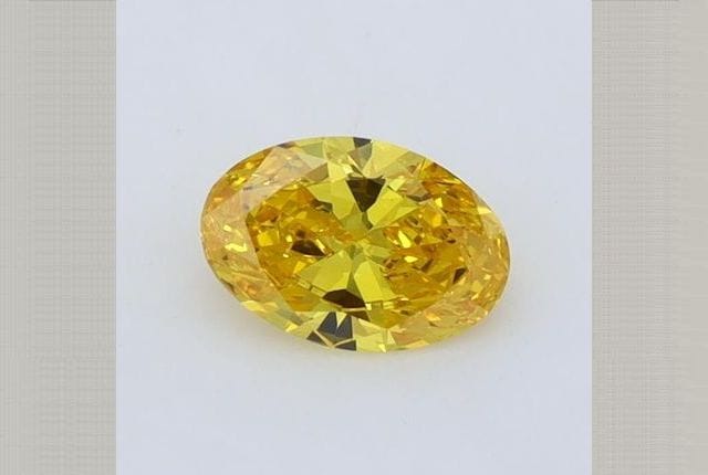 0.45 Carat Oval Yellow Lab Diamond