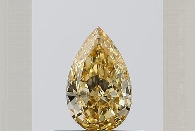 0.34 Carat Pear Yellow Lab Diamond