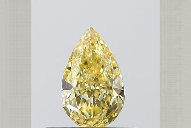 0.32 Carat Pear Yellow Lab Diamond