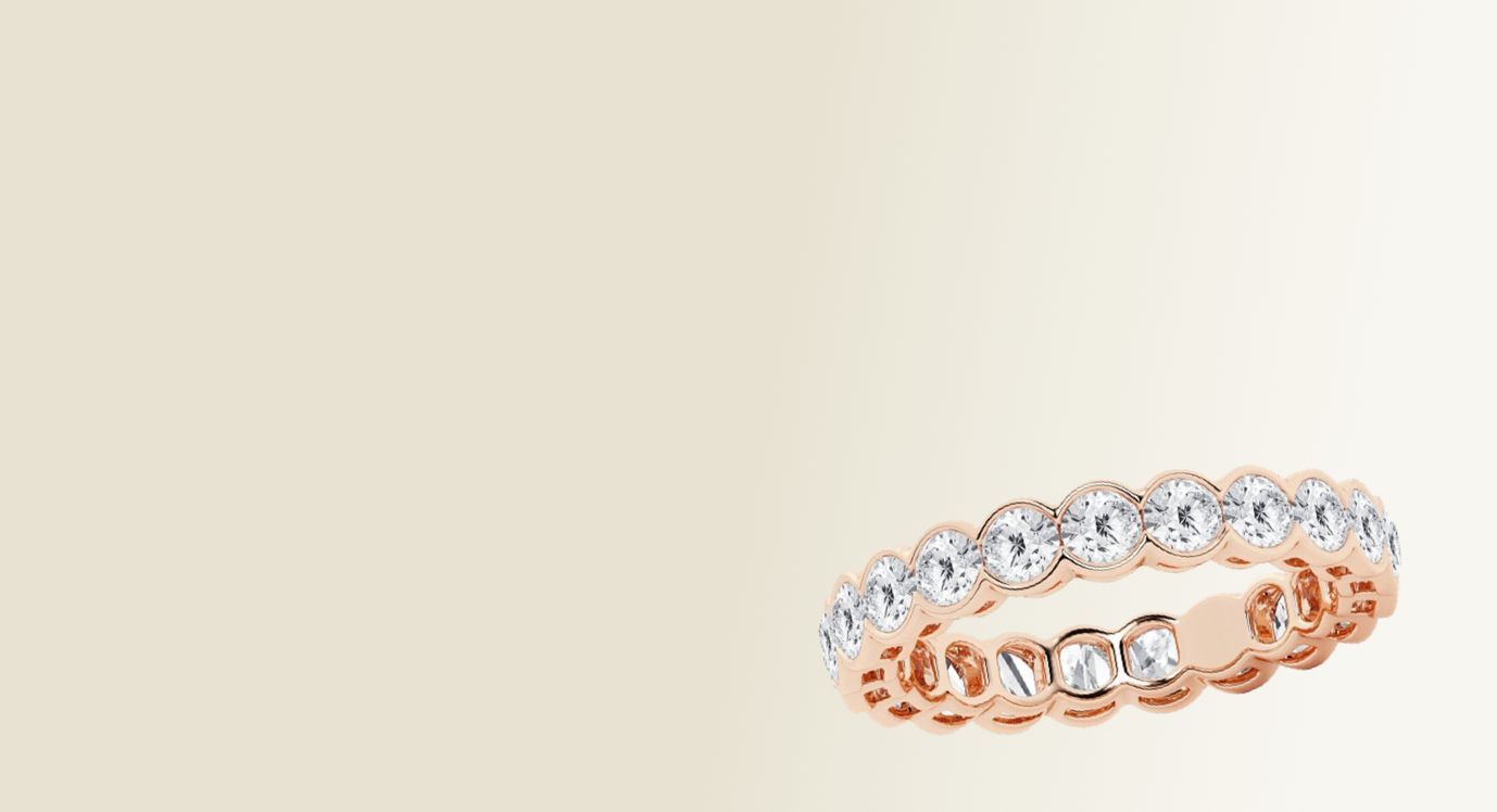 Diamond eternity rings in 18kt rose gold.