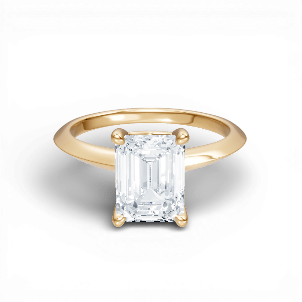 The Orielle Emerald Cut 14kt Yellow Gold Four-Prong Solitaire Engagement Ring