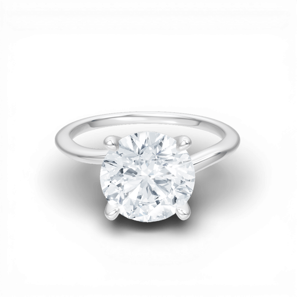 The Geneva Round Cut 14kt White Gold Four-Prong Solitaire Engagement Ring
