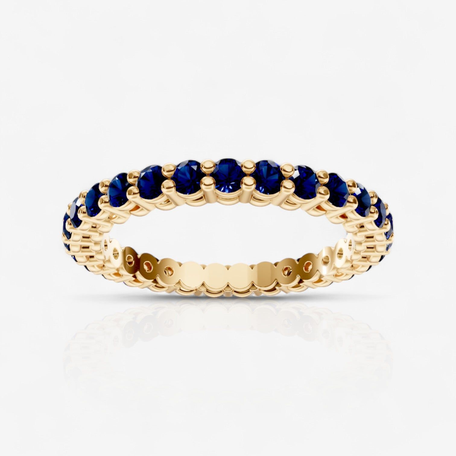 Round Shared Prong Sapphire Eternity Band