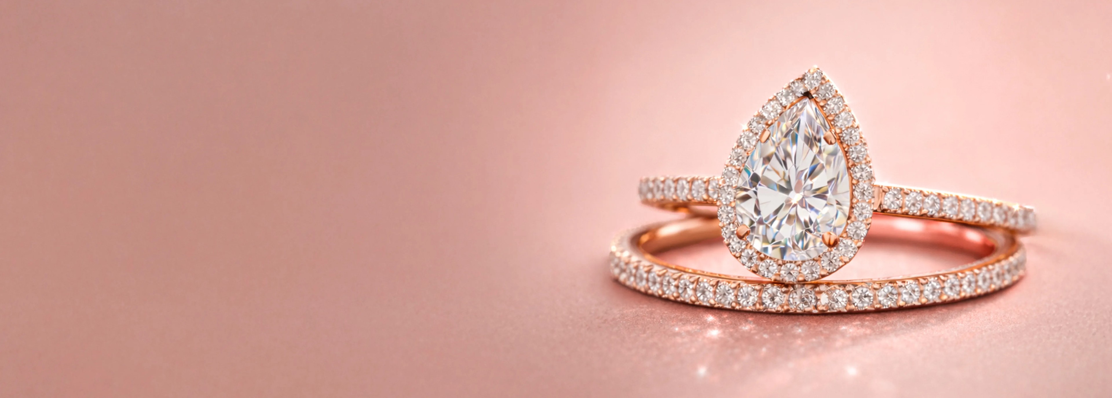 Pear Cut Diamond in Halo setting and Diamond wedding ring