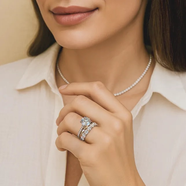 Beautiful lifestyle image of woman wearing matching wedding bands 