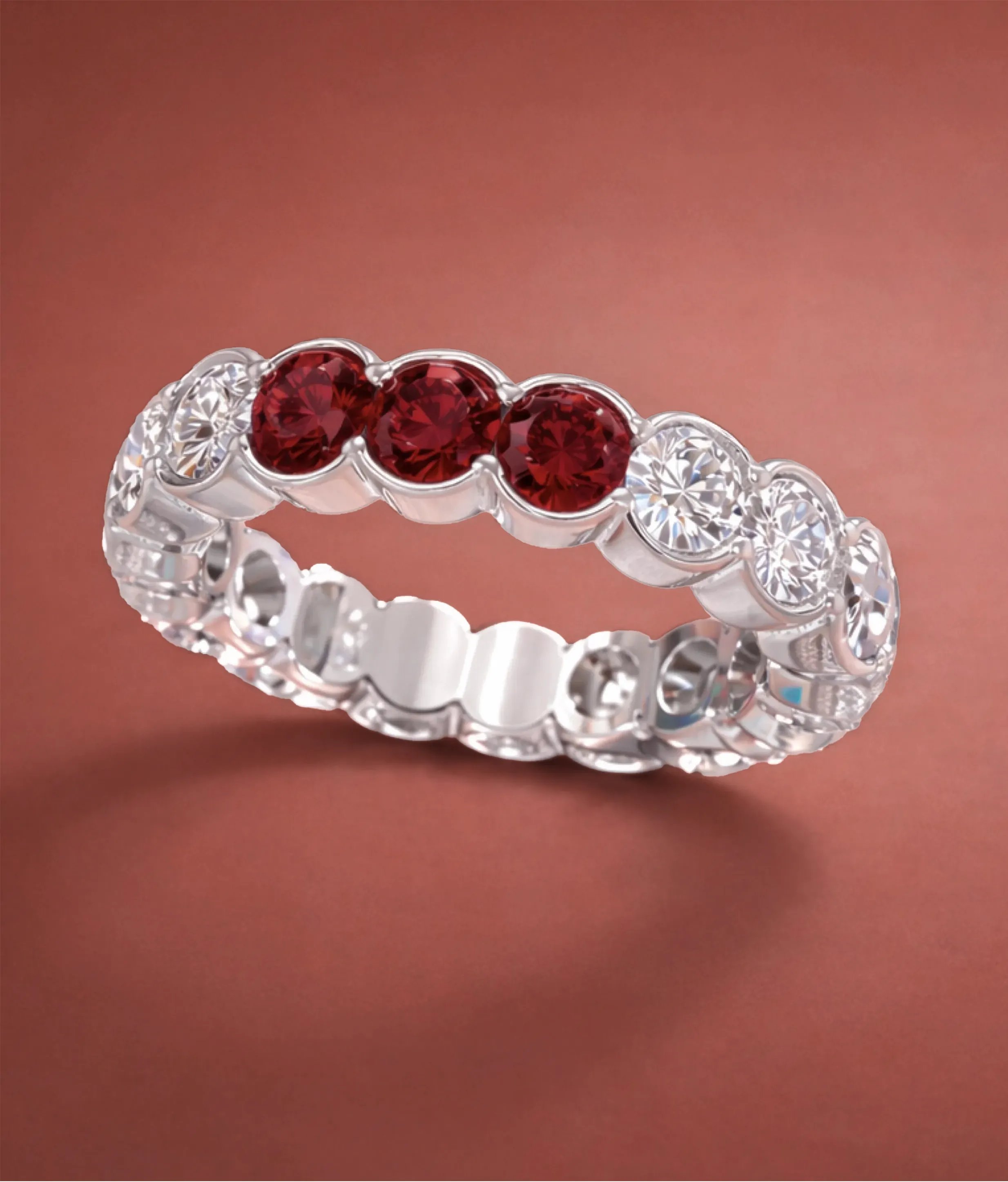 Custom Eternity Ring - 3 rubies set in a diamond white gold eternity band