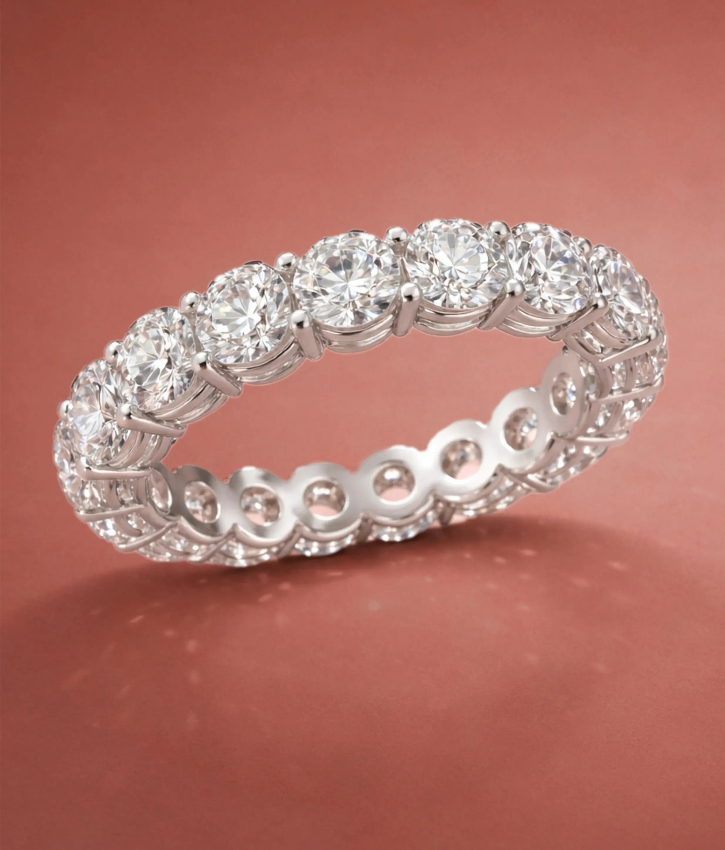 Eternity Ring on a reddish pink background
