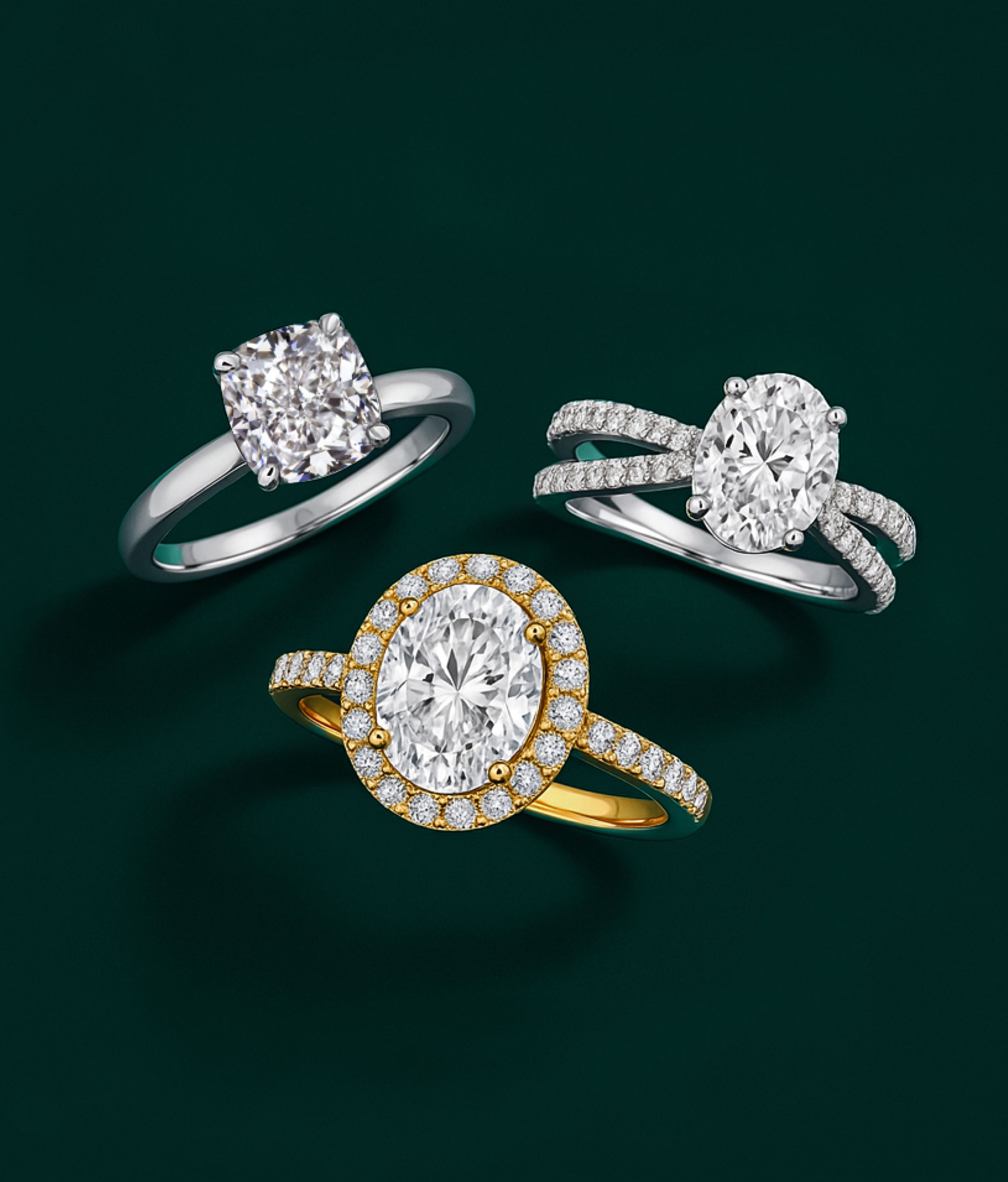 solitaire, sidestone, and halo engagement ring next to each other