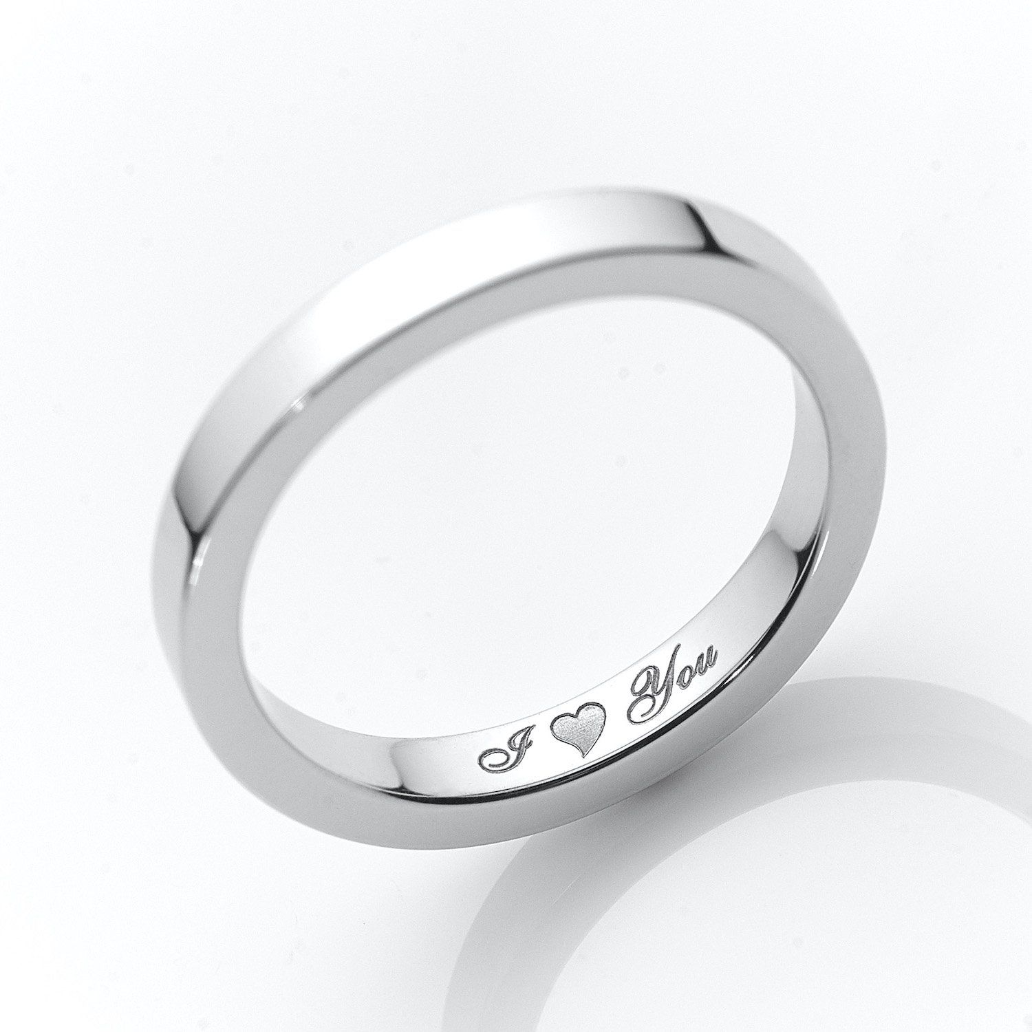 wedding band engraved with "I Love You" on the inside