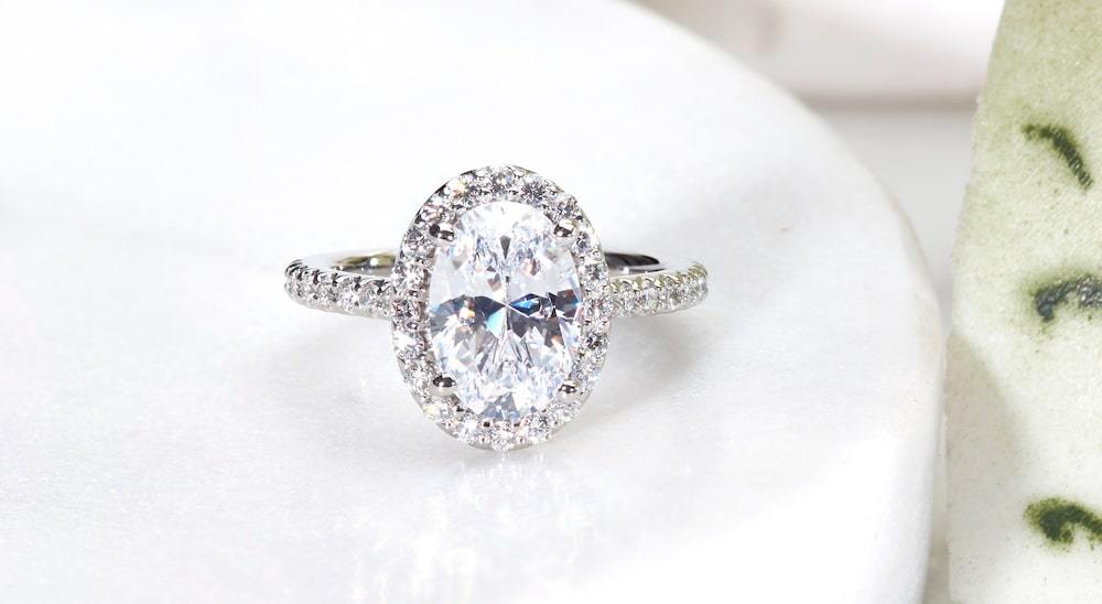 oval cut diamond engagement ring with halo