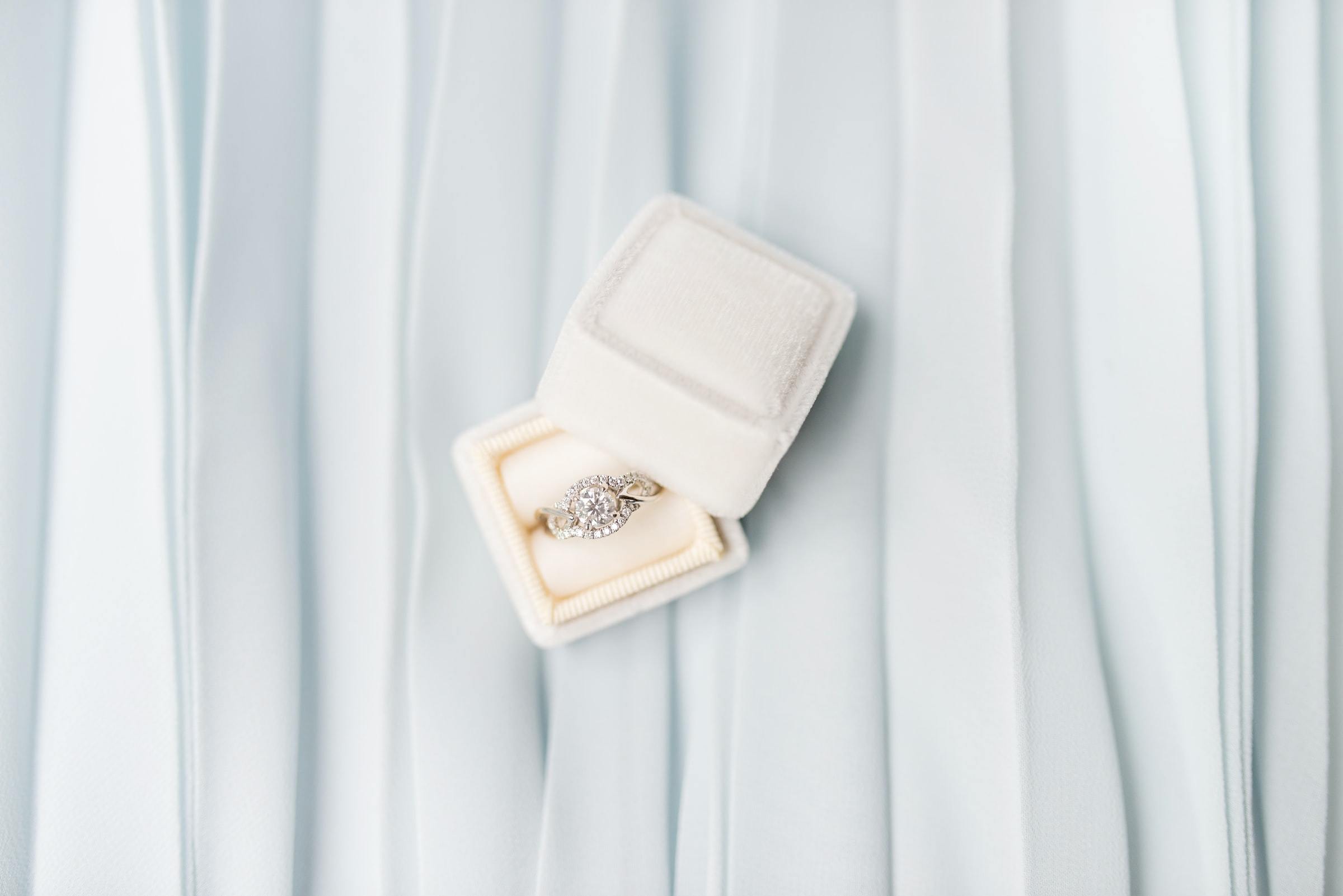unique engagement ring in velvet ring box 