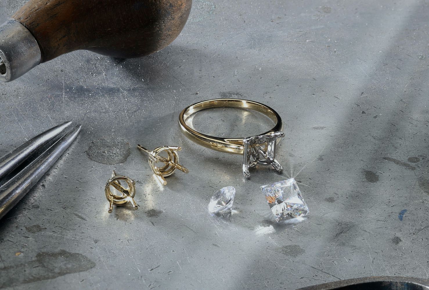 diamonds next to engagement ring and earring settings