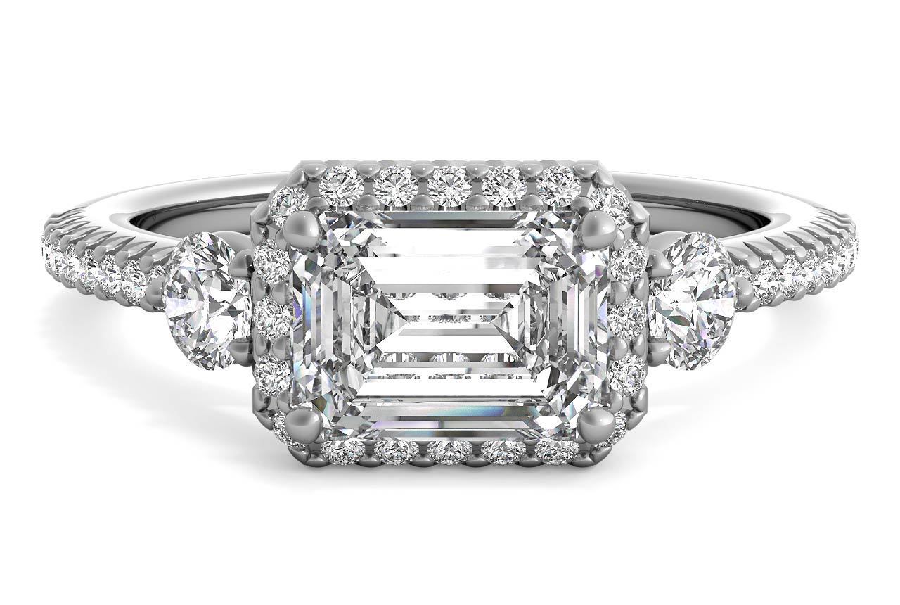Three Stone Emerald Engagement ring