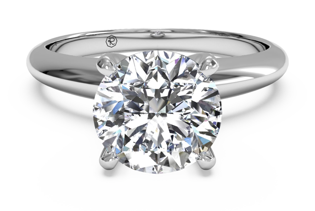 round cut four-prong engagement ring