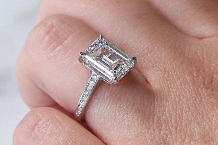 emerald cut engagement ring with channel-set diamonds