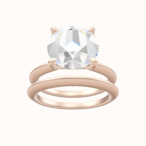 Beveled Solitaire Engagement Ring With Four Prong Head and Matching Band