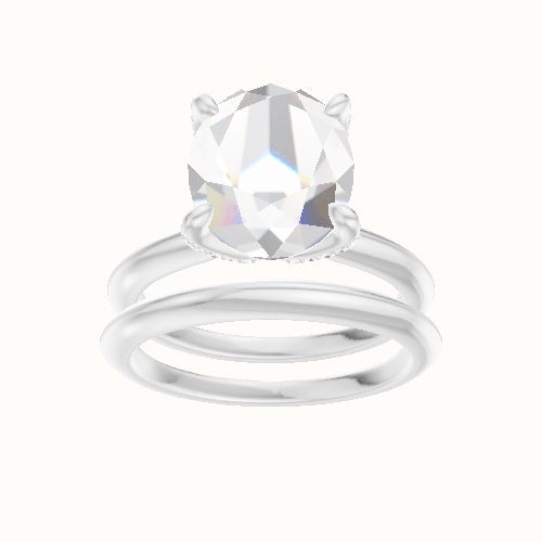 Beveled Solitaire Engagement Ring With Pave Petal Four Prong Head and Matching Band