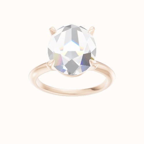 Beveled Solitaire Engagement Ring With Standard Four Prong Head