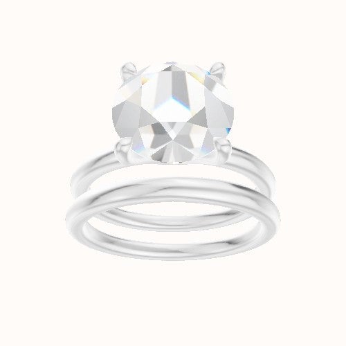 Classic Solitaire Engagement Ring With Four Prong Head and Matching Band