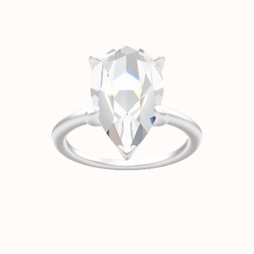 Classic Solitaire Engagement Ring With Low Set Four Prong Head