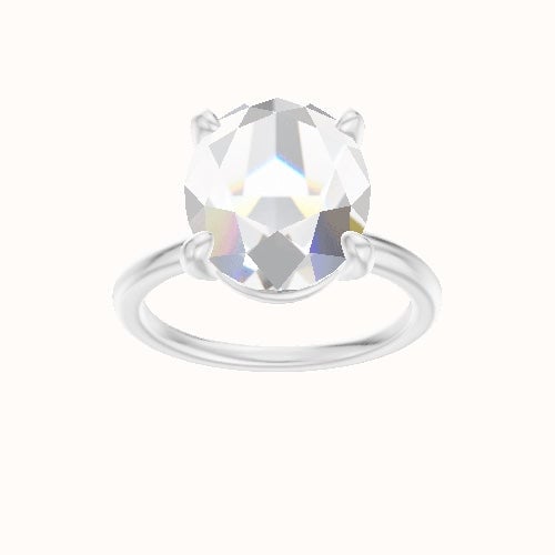 Classic Solitaire Engagement Ring With Low Set Four Prong Head