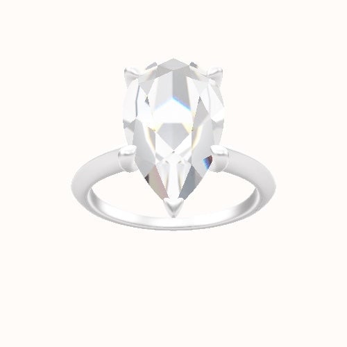 Knife Edge Engagement Ring With Four Prong Head