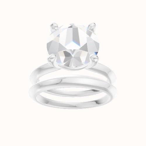 Knife Edge Engagement Ring With High Set Four Prong Head and Matching Band