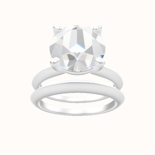 Knife Edge Engagement Ring With High Set Four Prong Head and Matching Band