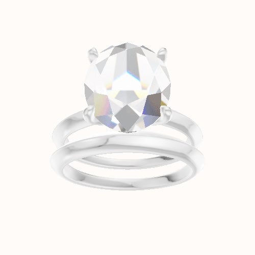 Knife Edge Engagement Ring With Petal Four Prong Head and Matching Band