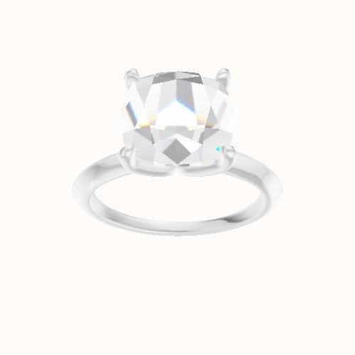 Knife Edge Engagement Ring With Petal Four Prong Head