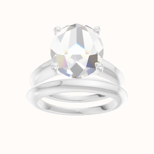 Modern Knife Edge Engagement Ring With Four Prong Head and Matching Band