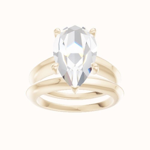 Modern Knife Edge Engagement Ring With Four Prong Head and Matching Band
