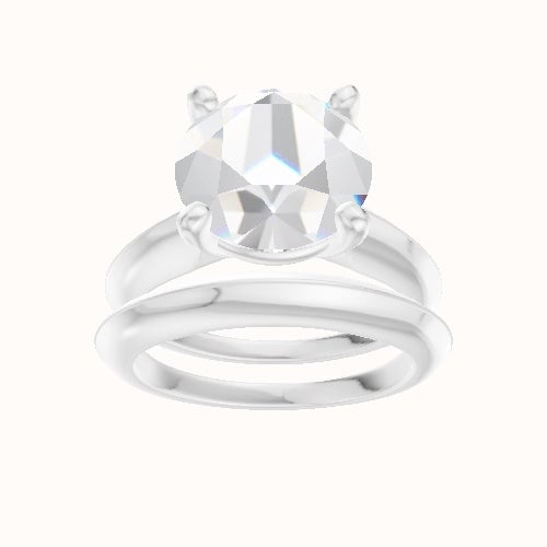 Modern Knife Edge Engagement Ring With High Set Four Prong Head and Matching Band