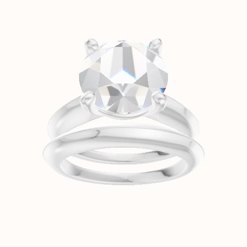 Modern Knife Edge Engagement Ring With High Set Four Prong Head and Matching Band