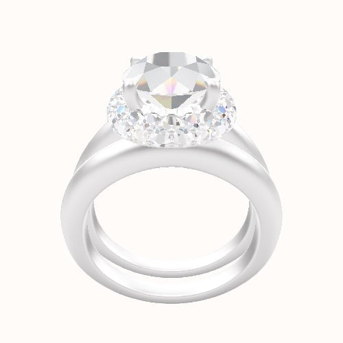 Modern Knife Edge Engagement Ring With Low Set Waterfall Halo Head and Matching Band