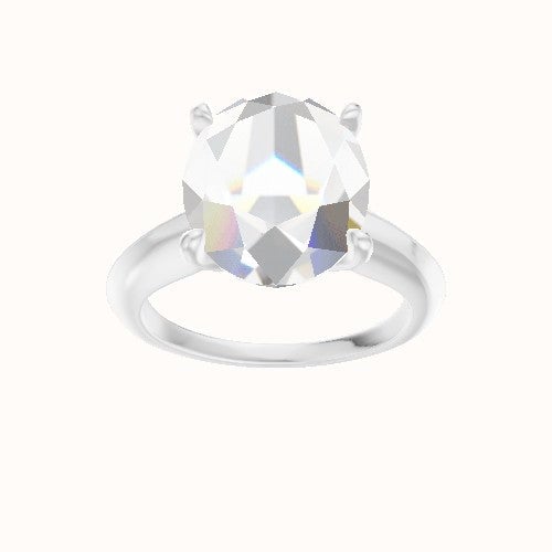 Modern Knife Edge Engagement Ring With Petal Four Prong Head