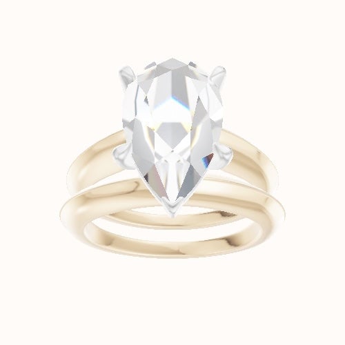 Modern Knife Edge Engagement Ring With Standard Four Prong Head and Matching Band