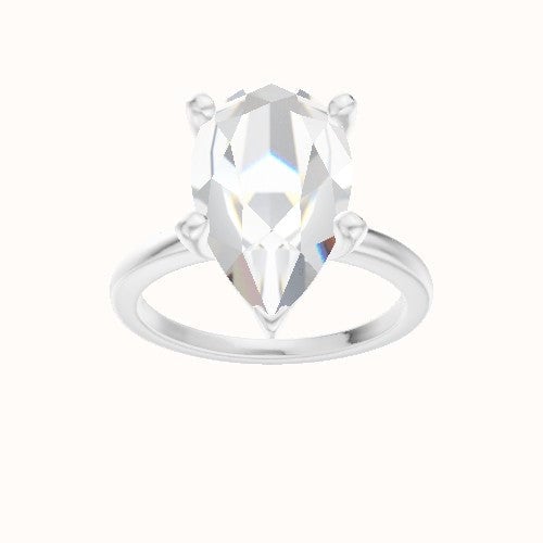 Open Solitaire Engagement Ring With High Set Four Prong Head