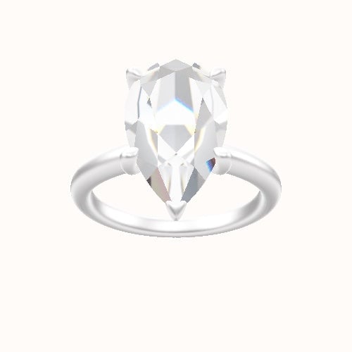 Rounded Solitaire Engagement Ring With Four Prong Head