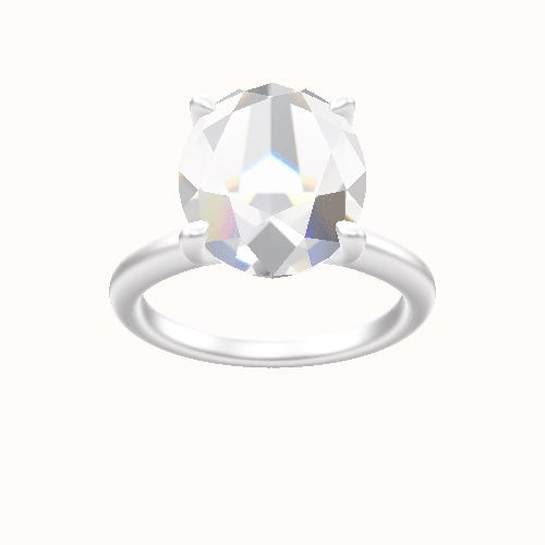 Rounded Solitaire Engagement Ring With Four Prong Head and Matching Band