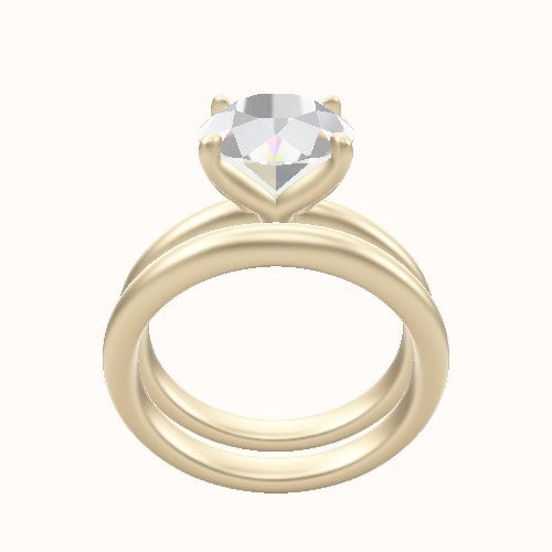 Rounded Solitaire Engagement Ring With Petal Four Prong Head and Matching Band
