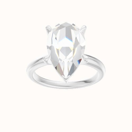 Rounded Solitaire Engagement Ring With Standard Four Prong Head
