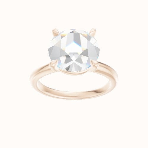 Rounded Solitaire Engagement Ring With Standard Four Prong Head
