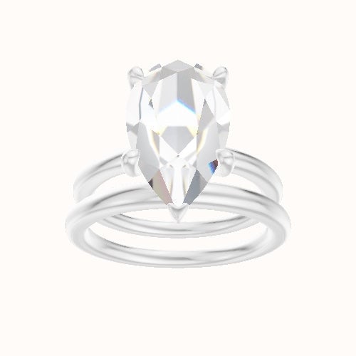 Solitaire Engagement Ring With Four Prong Head and Matching Band
