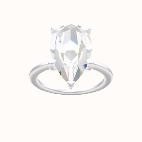 Solitaire Engagement Ring With Four Prong Head and Matching Band